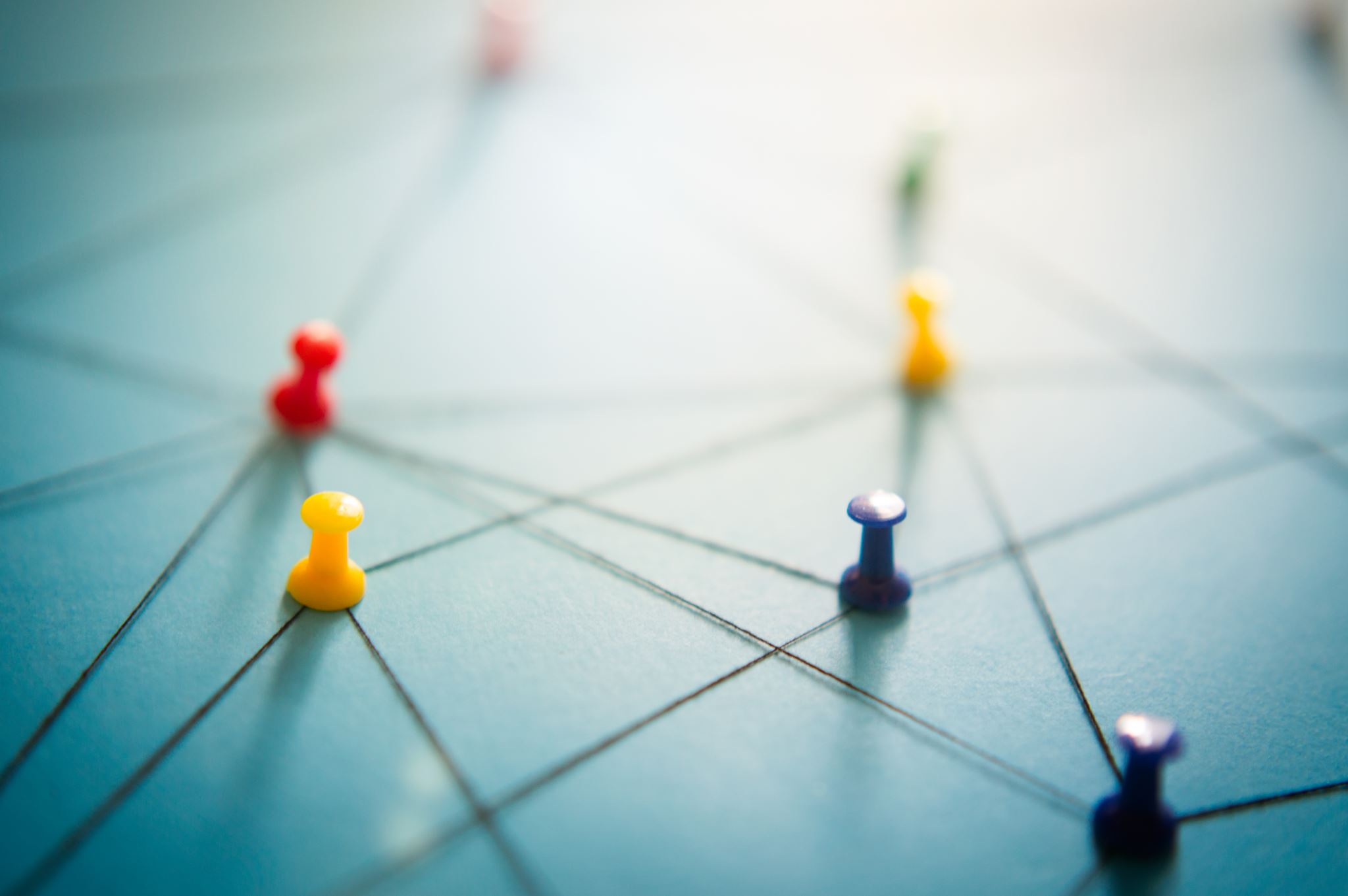 Pins connected on a map showing international market links